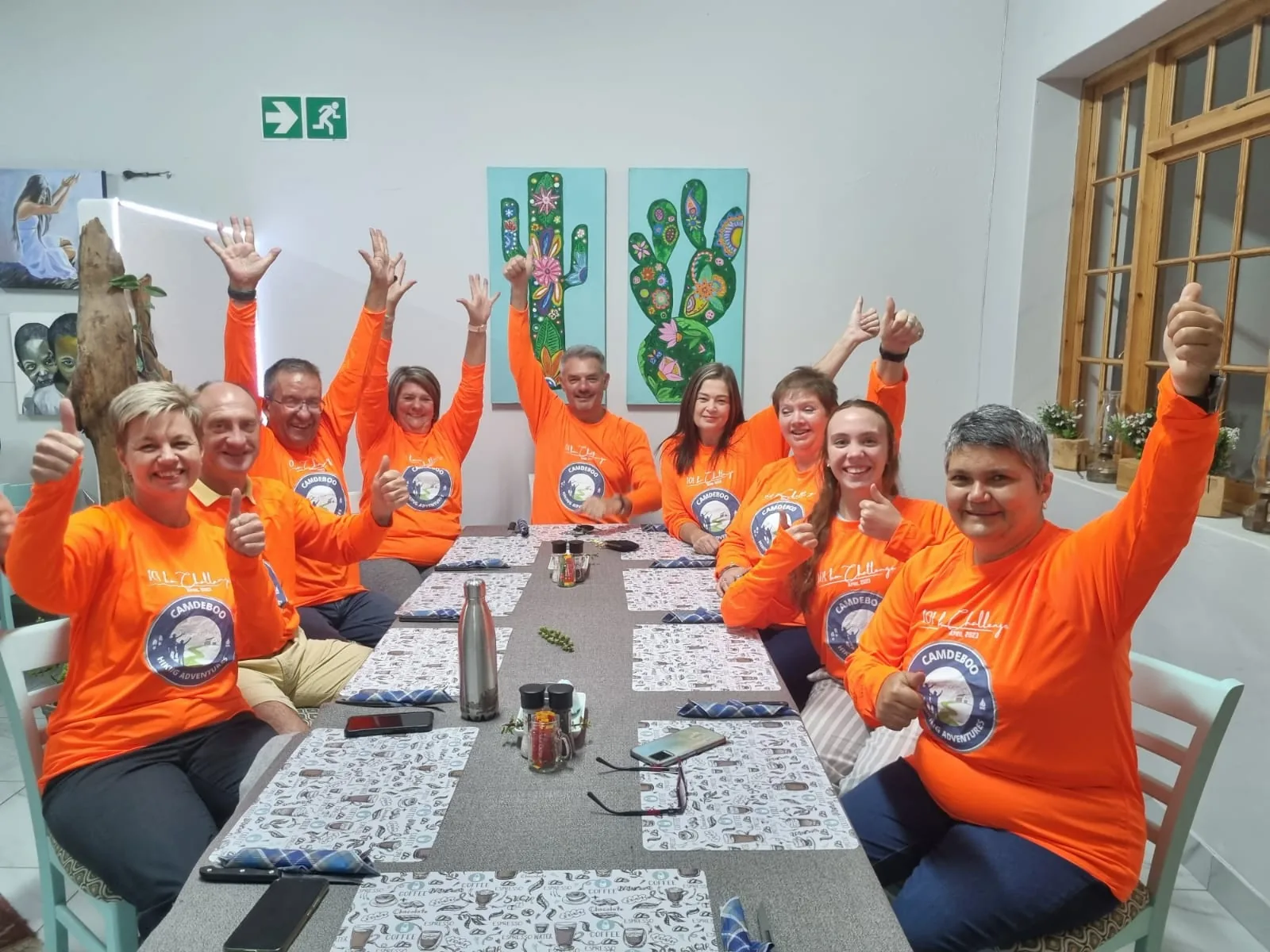 Full Moon Walk participants wearing event shirts together after the walk